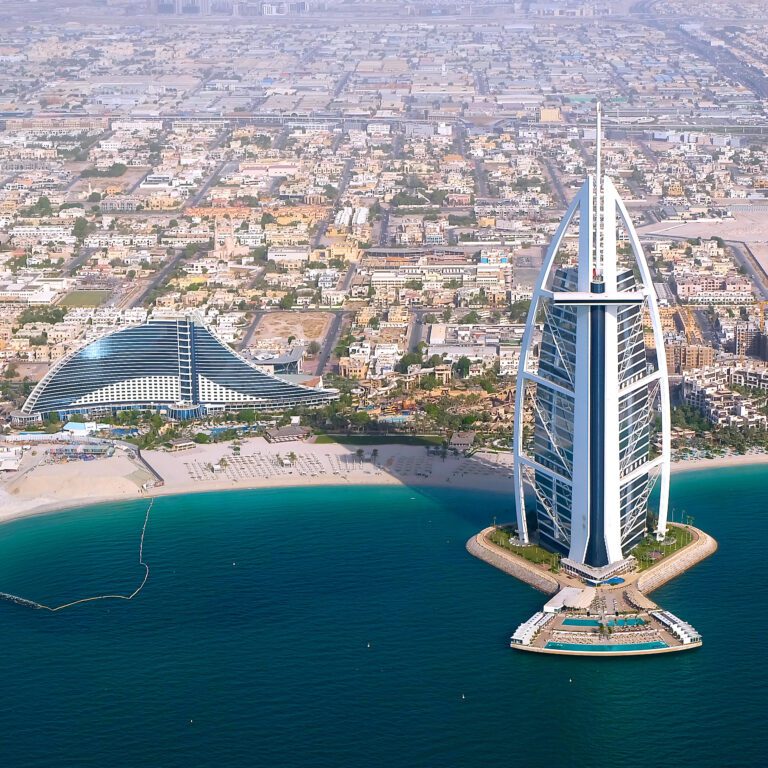 Helicopter view of Burj Al arab and Dubai beach with Helidubai helicopter journey